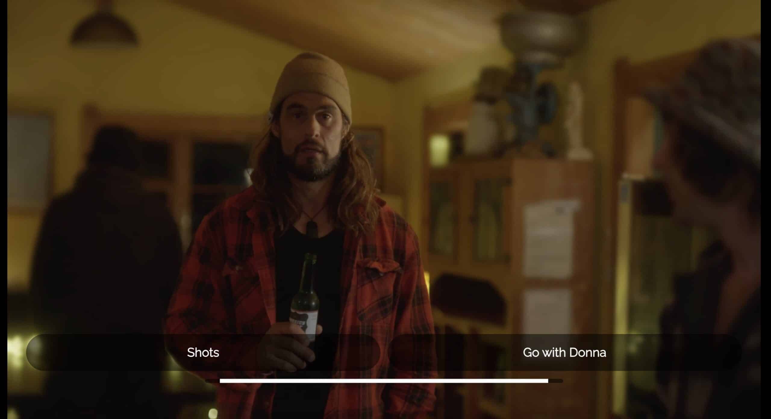 The Party - a man has a bottle of beer and is one screen with two choices for the viewer to click = "shots" or "go with Donna"